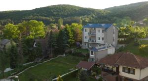an aerial view of a house in a village at Apartments Izvor in Vrdnik