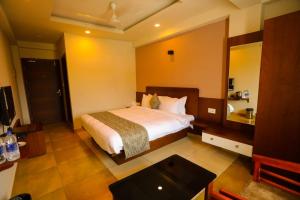 Zubis Inn Hotel客房内的一张或多张床位