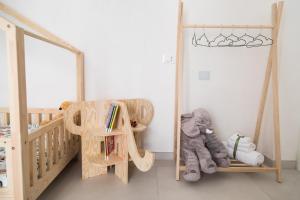 Postel nebo postele na pokoji v ubytování Family Green Suite