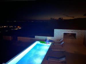 The swimming pool at or close to Kika Residences