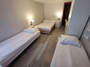 Postel nebo postele na pokoji v ubytování Gościnny Dom Kaola