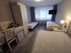 Postel nebo postele na pokoji v ubytování Gościnny Dom Kaola