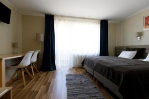 Postel nebo postele na pokoji v ubytování Spa Hotel Ezeri
