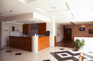 a lobby of a hospital with a waiting room at Alkion Hotel in Sidari