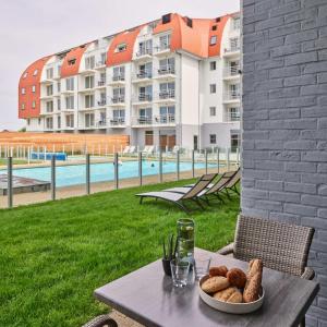 
The swimming pool at or near Holiday Suites Zeebrugge
