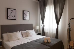 Postel nebo postele na pokoji v ubytování Zabalburu