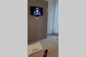 A television and/or entertainment centre at Alla Crosera del Santo