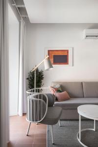 A seating area at Don Fadrique Apartments by Olala Homes