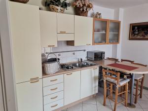 Kuchyň nebo kuchyňský kout v ubytování Villa Rosa