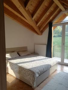 Ένα ή περισσότερα κρεβάτια σε δωμάτιο στο Residence TANA - via Pasubio
