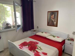 Postel nebo postele na pokoji v ubytování Villa Rosa