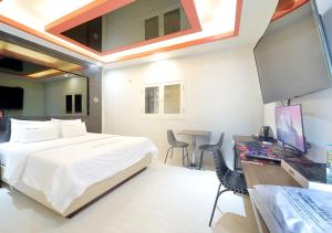 TV o dispositivi per l'intrattenimento presso HOTEL ViA