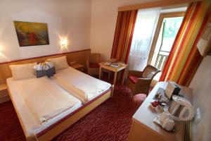 Łóżko lub łóżka w pokoju w obiekcie Hotel Eder Michaela