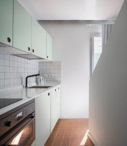A kitchen or kitchenette at Don Fadrique Apartments by Olala Homes