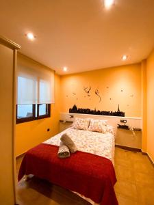 Postel nebo postele na pokoji v ubytování Apartamentos Turisticos Graus