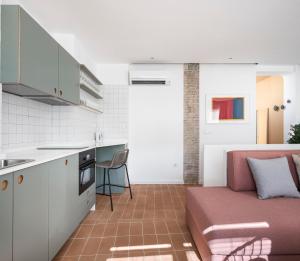 A kitchen or kitchenette at Don Fadrique Apartments by Olala Homes