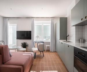 A kitchen or kitchenette at Don Fadrique Apartments by Olala Homes