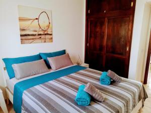 Postel nebo postele na pokoji v ubytování Casa del Sol PDC
