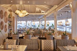 Reštaurácia alebo iné gastronomické zariadenie v ubytovaní MarBella, Mar-Bella Collection