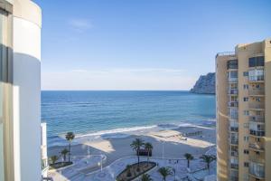 a view of the ocean from a building at Apartamentos Hipocampos Calpe Rent Apart in Calpe