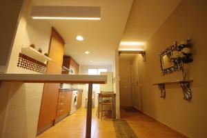 A kitchen or kitchenette at Livingtarifa La Rosa Blanca