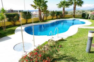 The swimming pool at or close to Livingtarifa La Rosa Blanca