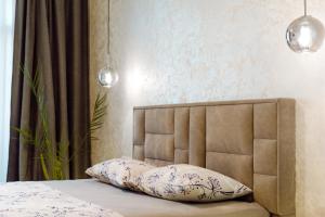 Posteľ alebo postele v izbe v ubytovaní Panorama Luxury Apartment in The House with a Spire, a historical building in the city centre
