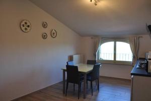 Et tv og/eller underholdning på appartamento Le Mongolfiere