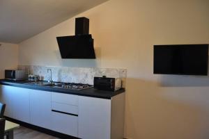 Køkken eller tekøkken på appartamento Le Mongolfiere + 4 billeder