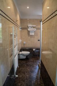 Koupelna v ubytování Hotel La Noce