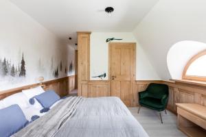 Łóżko lub łóżka w pokoju w obiekcie Apartamenty Franka Zakopane