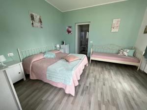 Postel nebo postele na pokoji v ubytování Bed and Breakfast da Beatrice