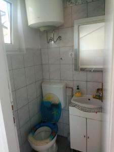 Koupelna v ubytování Apartments Tomisa