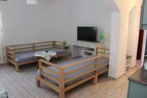 TV a/nebo společenská místnost v ubytování Aaron Apartments