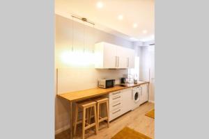 Kuchyňa alebo kuchynka v ubytovaní RP2 Apartment