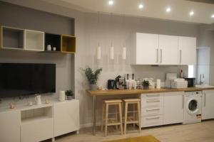 Kuchyňa alebo kuchynka v ubytovaní RP2 Apartment