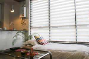 Sky Suites - Stunning Location with a great view of La Paz客房内的一张或多张床位