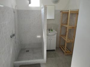 Ванная комната в Bendegúz apartman