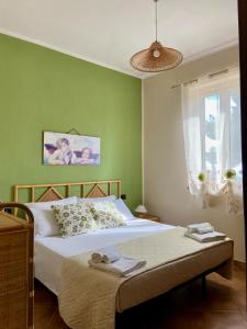 A bed or beds in a room at Villa Chiara