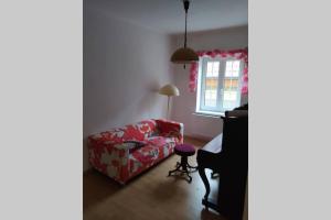 Postel nebo postele na pokoji v ubytování Apartmán na Náměstí ve Štramberku + 4 fotografie