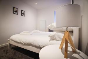 Postel nebo postele na pokoji v ubytování Clifftop Cottage