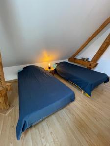 Un pat sau paturi într-o cameră la Spacieux T3 coeur de ville