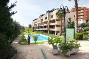 Bazén v ubytování Riviera del Sol EDEN GOLF nebo v jeho okolí