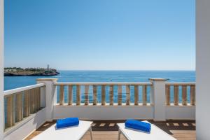 a balcony with a view of the ocean at Orange Colom - Seaside Apartments in Portocolom