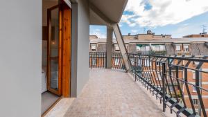 a balcony with a view of a building at Hotel San Marco in Reggio Emilia