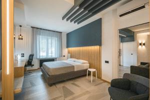 A bed or beds in a room at Leukosìa Holiday House