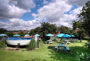 Een tuin van The Ship At Dunwich