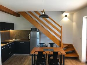 Kuchyňa alebo kuchynka v ubytovaní Horské apartmány Na Pastvinách