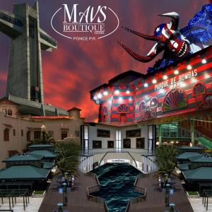 vista para o resort mitzvah e casino à noite em Mavs Boutique At Ponce em Ponce