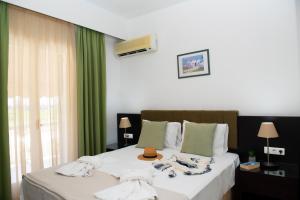 Postel nebo postele na pokoji v ubytování Villa Lilly